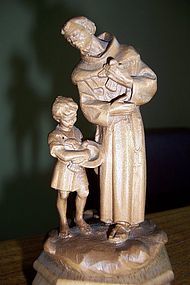 Wood sculpture of Saint Francis of Assisi and the doves