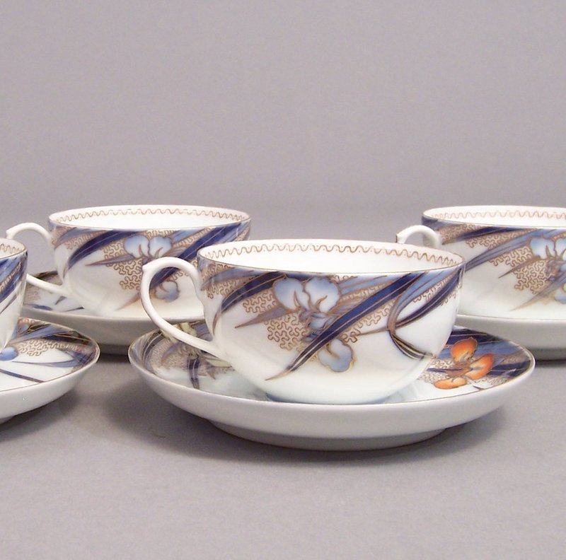 Fukagawa Iris pattern tea cup and 5 3/8 inch saucer