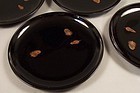 Four Zohiko lacquer plates, 7 3/4 inch, feather motif