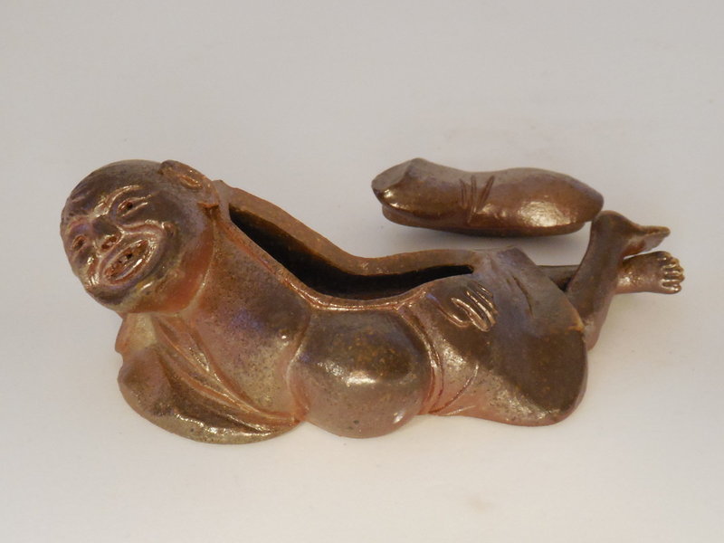 A 20th Century Bizen Kogo Depicting A Reclining Sage or Monk