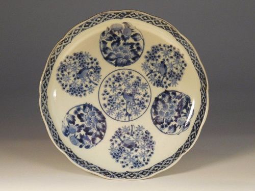 A Japanese Shonsui Style Blue & White Porcelain Foliate Dish, Roundels