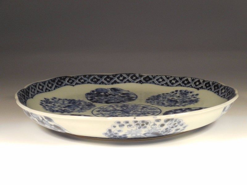 A Japanese Shonsui Style Blue &amp; White Porcelain Foliate Dish, Roundels