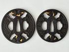 Pair, daisho, iron tsuba. Bushu ju Masanaga. Basket weave, blossoms