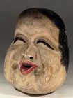 Edo period carved and painted wood Noh mask depicting Otafuku (Okame)