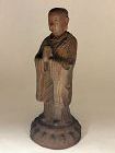 Ming dynasty iron figure of Dizang (as a monk) standing on lotus base