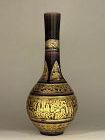 Eiraku kiln aubergine glazed vase. Gilt enamel washed archaistic motif
