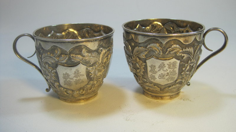 A Pair Of Early 20th C. Chinese Export Silver Cups