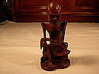 A carved Chinese wood monk