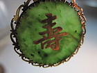 Chinese Spinach Green Jade Pendant Mounted on Silver