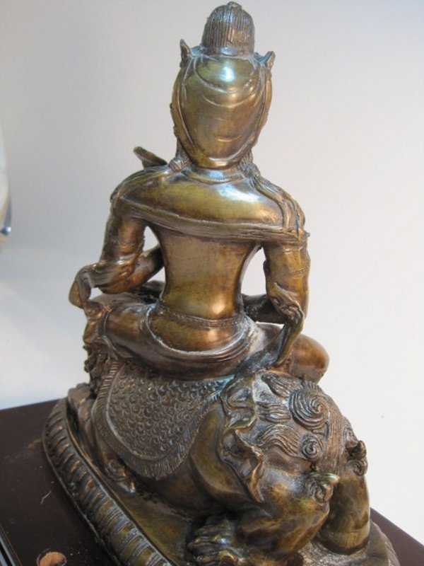 A 19th C. Chinese Bronze Quanyin Sitting On A Foo Lion
