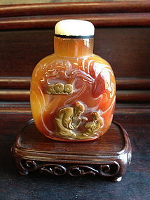 A large carved agate Chinese snuff bottle