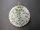 Carved Chinese lavender and green pendant