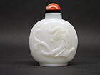 Chinese white milk glass snuff bottle with chilon drago