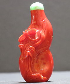 Chinese coral snuff bottle with jadeite stopper