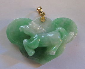 Carved jadeite horse plaque with 14k yellow gold