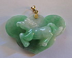 Carved jadeite horse plaque with 14k yellow gold