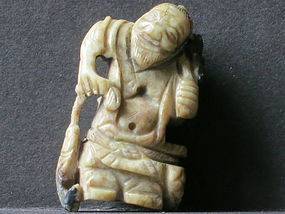 A mottled jade fishman pendant