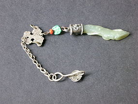 Carved jade and silver lucky charm