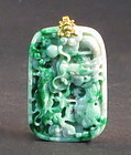 Jadeite dragon pendant with gold loop