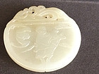 Carved white jade pendant