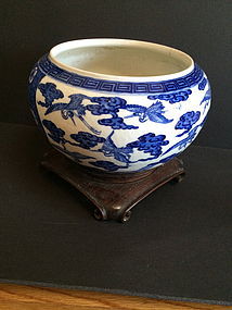 Chinese blue and white porcelain bowl with wood base