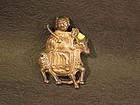 Chinese gilt silver   repousse  rider with horse