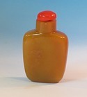 yellow jade caramel carved snuff bottle