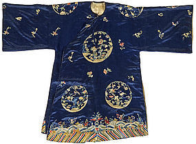 A woman's embroidered blue silk informal robe