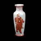 Iron-Red Figural Vase. {Height: 8 inches (20.3 cm)}.
