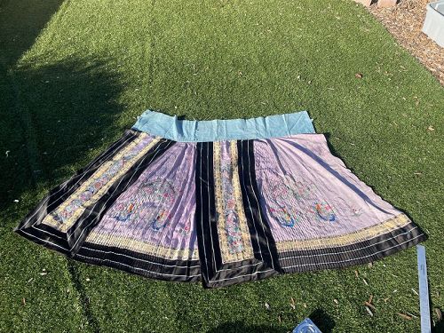 A lavender ground Chinese silk pleated apron skirt