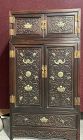 A Chinese Compound Carved Rosewood Cabinet.