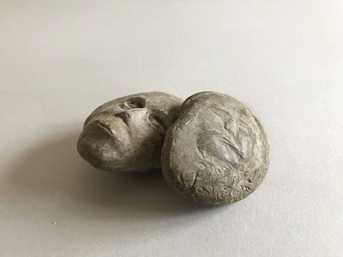 HUMAN-FACED STONES 2pc.