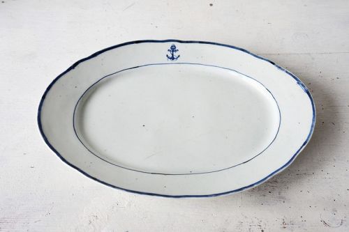 LARGE OVAL PORCELAIN PLATE WITH ANCHOR INSIGNIA