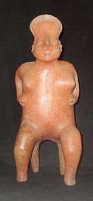 A LARGE SEATED NAYARIT FIGURE FROM WEST MEXICO