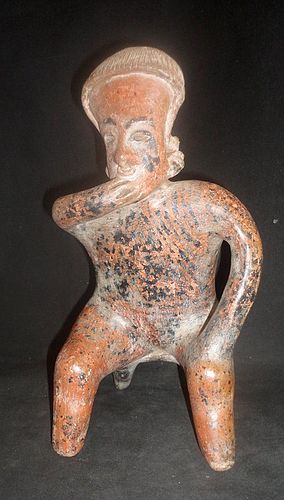 A LARGE NAYARIT SEATED BENCH FIGUERE FROM WEST MEXICO