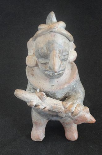 A FINE MINATURE NAYARIT WARRIOR / BALL PLAYER EFFIGY FROM WEST MEXICO