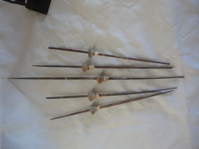 FIVE PRE-COLUMBIAN WEAVING INSTRUMENTS MOUNTED ON A HEAVY METAL BASE