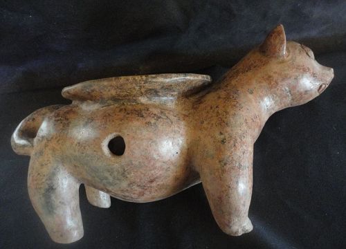 A FINE SWEET-NATURED COLIMA VESSEL IN THE SHAPE OF A STANDING DOG