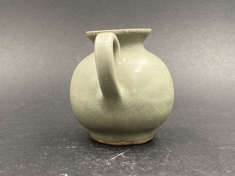 A Yuan Dynasty Longquan Celadon Teapot or Dropper