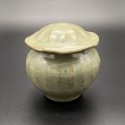 A Chinese Yuan Dynasty Celadon Glazed Jar with Ribbed Design