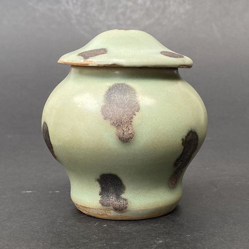 A Chinese Yuan Dynasty Longquan Celadon Jar with Iron-Spots