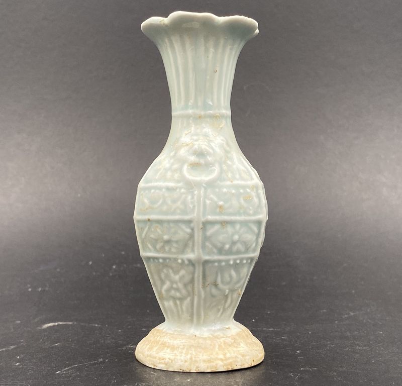 A Yuan Dynasty Qingbai Glazed Molded Vase with Petalled Rim