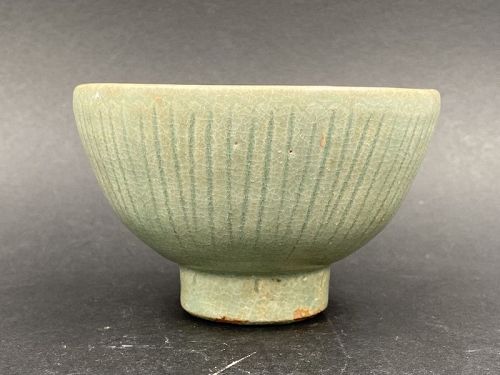 A Chinese Ming Dynasty Longquan Celadon Bowl with Chrysanthemum Petals