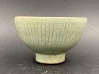 A Chinese Ming Dynasty Longquan Celadon Bowl with Chrysanthemum Petals