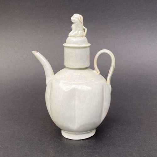 A Northern Song Dynasty Qingbai Melon Shaped Ewer with Lion Cover.