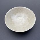 A Southern Song Dynasty Celadon Glazed Bowl with Cloud Decoration