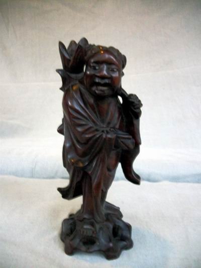 CARVED WOODEN STATUE