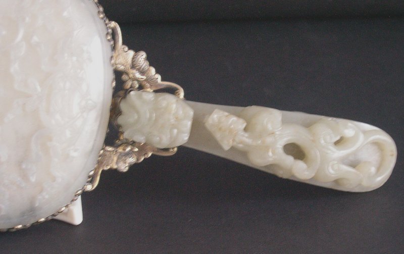 Chinese 19 C. jade plaque and belt hook mounted on a mirror