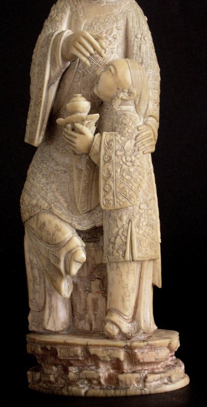 Chinese ivory group of lady and boy