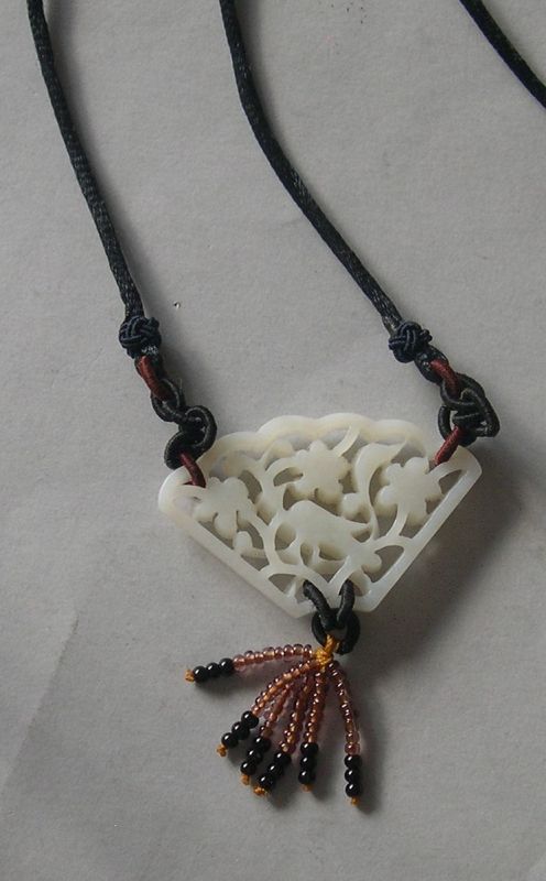 Chinese jade pendant with pierced and carved decoration Republican